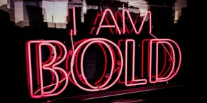 Neon sign that says I am bold