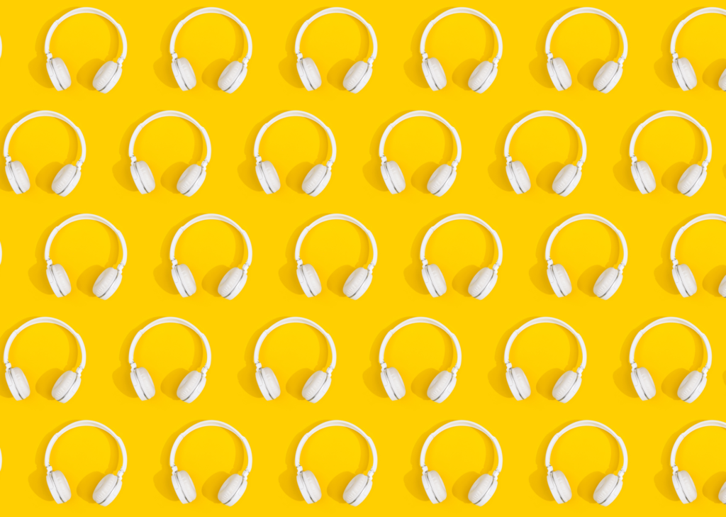 White Over-Ear Headphone Pattern Over Bright Yellow Background
